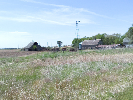 A
        working farm viewed from Morman Island Bike Path